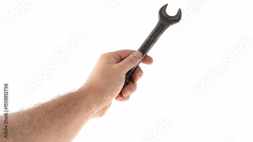 Hand holding a wrench against a white background