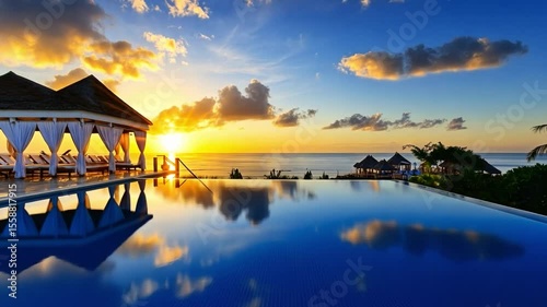 A stunning ocean view with a luxurious pool at sunset, capturing the sky's reflection on the water