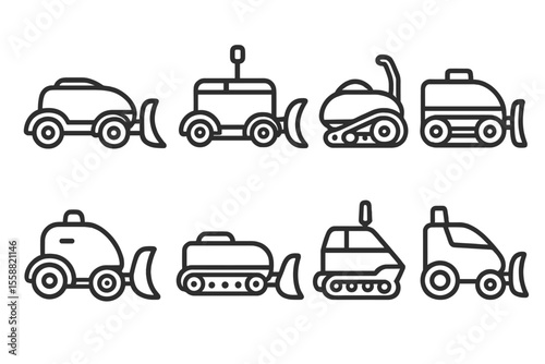 Varied snow removal vehicles lined up for winter operations in a snowy landscape