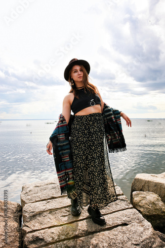 under the clothing of the world's indigenous peoples. International Day of the World's Indigenous Peoples. Against the backdrop of a lake
