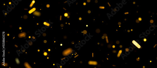 Abstract falling gold confetti scattered on dark background, shimmering festive glitter particles, celebration events, shiny digital texture overlay, sparkling holiday design element