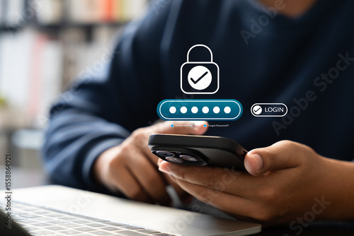 Cyber security, Businessman using smartphone with password login interface,secure access, Identity verification. Concept of protecting sensitive data and ensuring online privacy through authentication