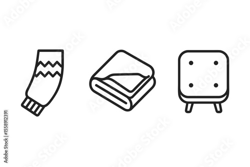 Black and white outline of a sweater, blanket, and upholstered stool