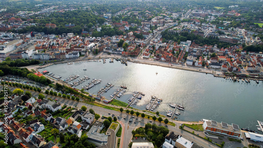 Obraz premium Aerial view of the old town of the city Flensburg in Germany on an overcast day in afternoon