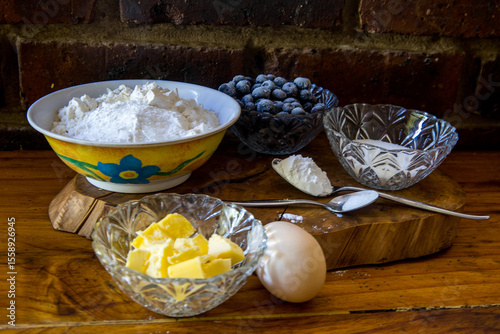 Ingredients prepared and measured out for baking blue berry muffins.