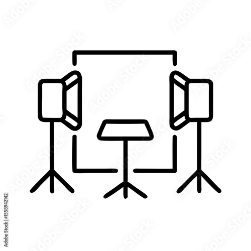 Studio lighting setup with softboxes and a blank table background  