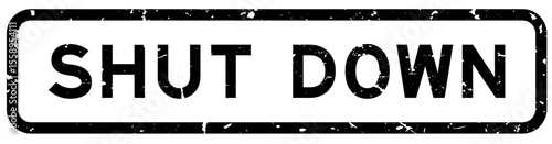 Grunge black shut down word rubber square seal stamp on white background