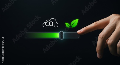 Hand adjusting a digital slider, showing CO2 reduction and a green leaf symbol