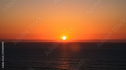 Dramatic Sunset Horizon with Golden Edge Light Silhouetting Mountain Peaks and Cloud Layers, Vibrant Twilight Gradient Sky Featuring Radiant Glow and Atmospheric Perspective