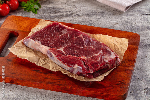 Gourmet raw rib eye steak