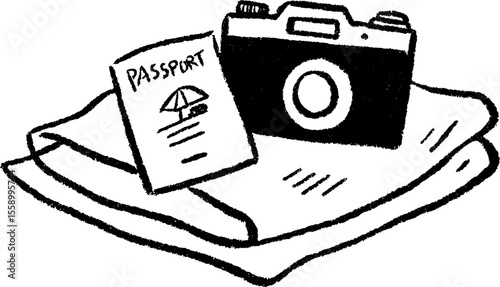 Travel essentials: camera and passport sketch on beach towel
