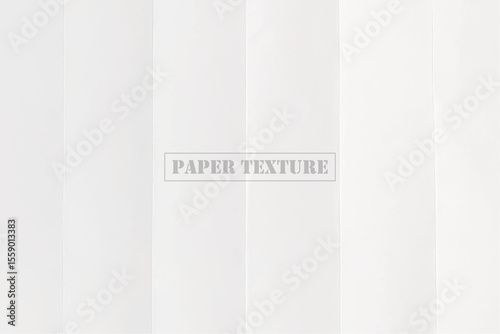 Close-up shot of folded paper with a plain white surface. Subtle creases and soft shadows suggest a sense of order and structure, perfect for minimalistic designs.