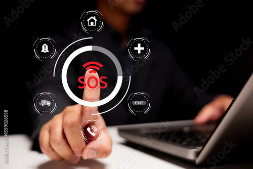 A person presses a glowing SOS emergency button on a virtual interface, surrounded by icons representing home, health, exit, and communication.