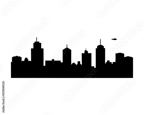 Dramatic black skyline silhouette with an object flying above the city