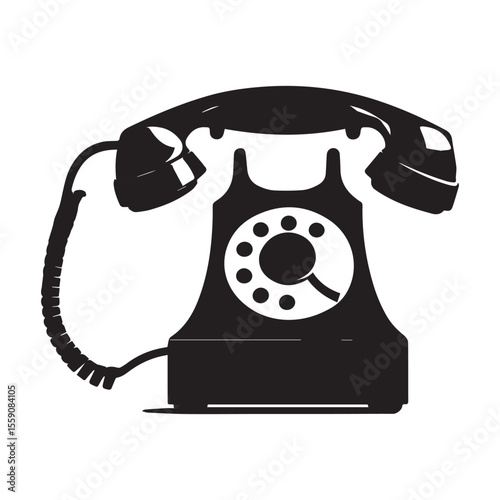 An antique rotary dial telephone sits isolated on white background