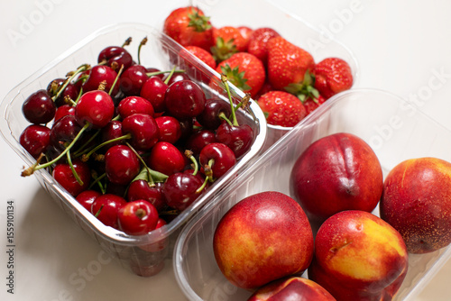 A medley of vibrant cherries, strawberries, and nectarines, perfect for a Midsummer feast or National Fruit Day indulgence