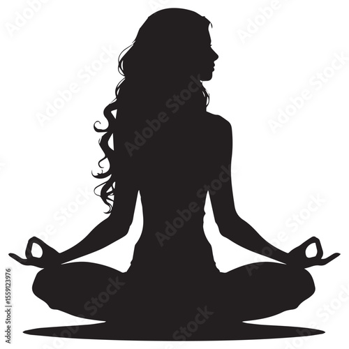 Silhouette of a woman meditating in a lotus position with her hands in a mudra