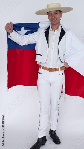Chilean huaso holding chile flag with pride on white background, Fiestas Patrias celebration 