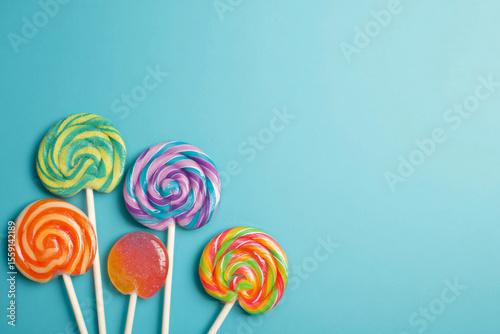 Colorful Lollipops on Blue Background