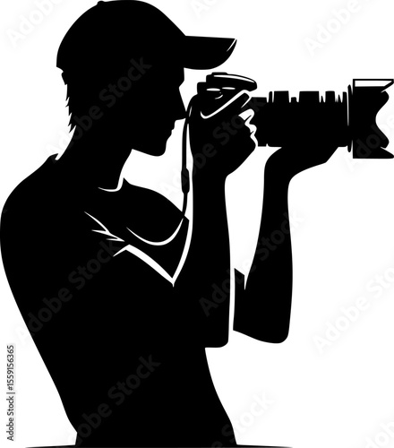 Silhouette of photographer kneeling with camera, in action shot