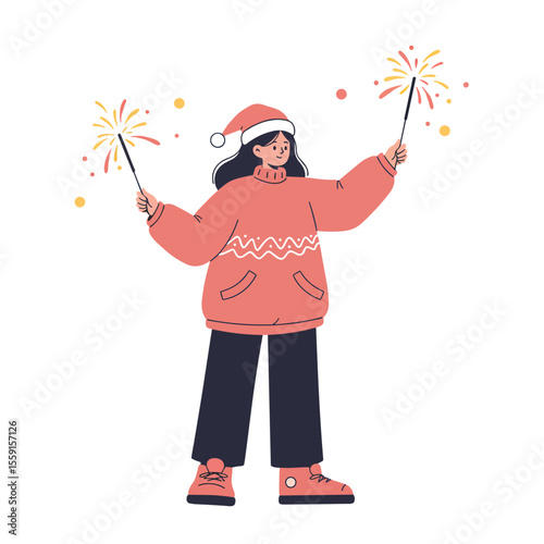 Girl waving sparklers while celebrating Christmas and New Year  
