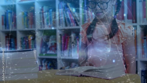 Child girl touching open book initiating holographic grid for analyzing text overlaying study table