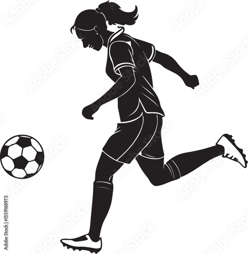Silhouette of a soccer player kicking a ball during a game