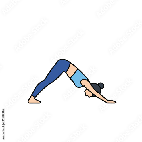Young woman doing yoga handstand pose in a fitness studio