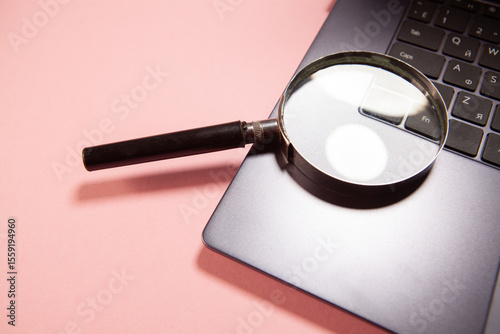 computer with a magnifying glass