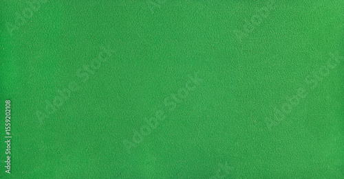Smooth billiard cloth texture in green, close-up surface view