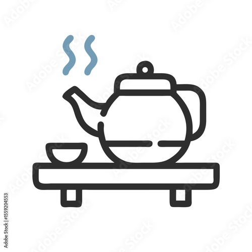 Teapot with steaming water on wooden table and cup for hospitality  