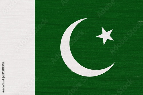Wooden texture painted in colors of flag of Pakistan. Flat view
