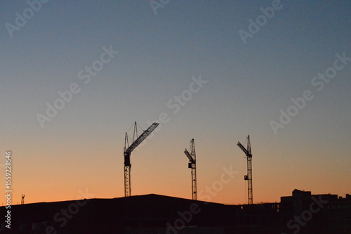 crane at sunset in the city