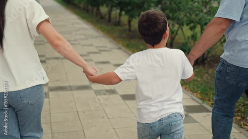 Little Child Holding Parent Hand, Boy Son Running With Parents Park, Mother Father Child Running Feet On Pavement, Happy Family, Man Woman Child Running Walking In The Park, Child Play