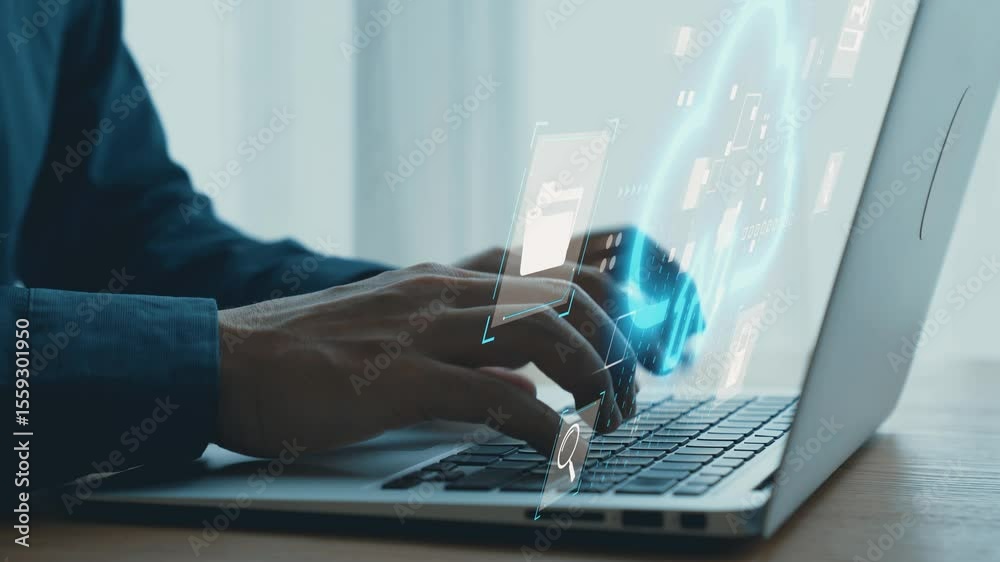 Professional man typing on laptop with digital technology interface illustrating cloud storage and data management concepts in modern workspace. Qubit.