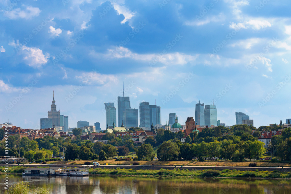 Fototapeta premium Cityscape - view of the district of Srodmiescie in the center Warsaw, view from the Vistula River, Poland