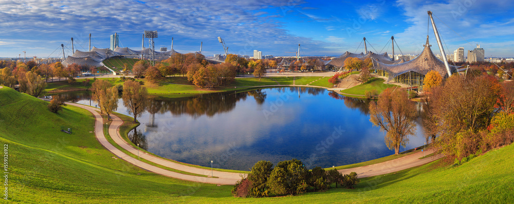 Obraz premium Autumn cityscape, panorama, banner - view of the Olympiapark or Olympic Park and Olympic Lake in Munich, Bavaria, Germany
