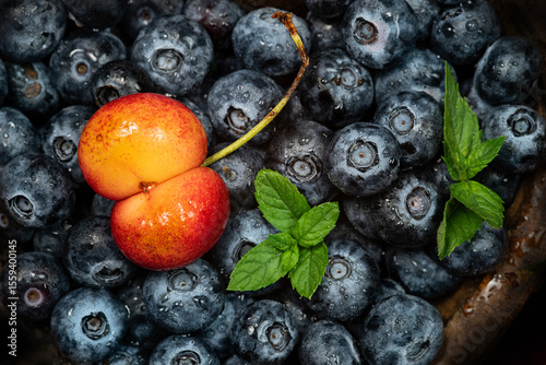 blue berries and one cherry 