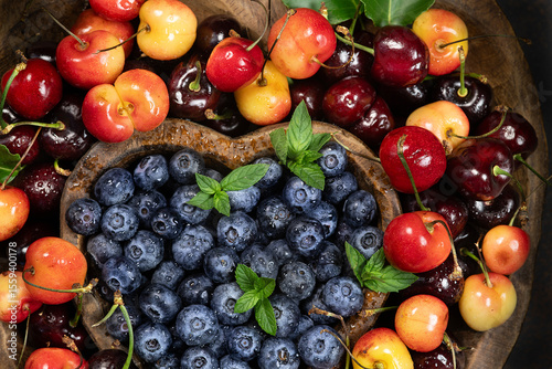Cherries and blue berries heart 