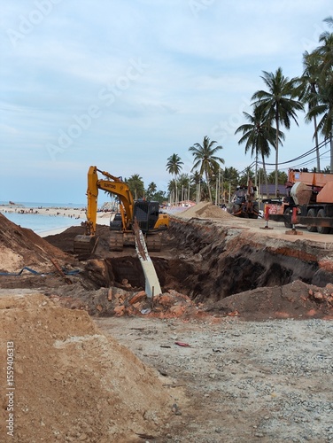 excavator on the beach