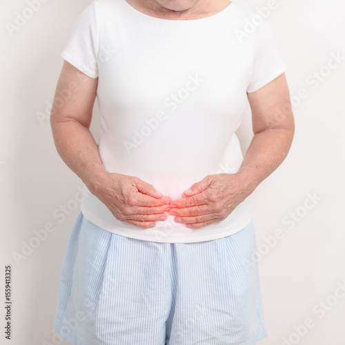 Wallpaper Mural Elderly woman having Colon pain for Colonic disease, Inflammatory Bowel, IBD, Colorectal cancer, Ulcerative colitis, Diverticulitis, Irritable bowel syndrome, Digestive system and Health concept Torontodigital.ca