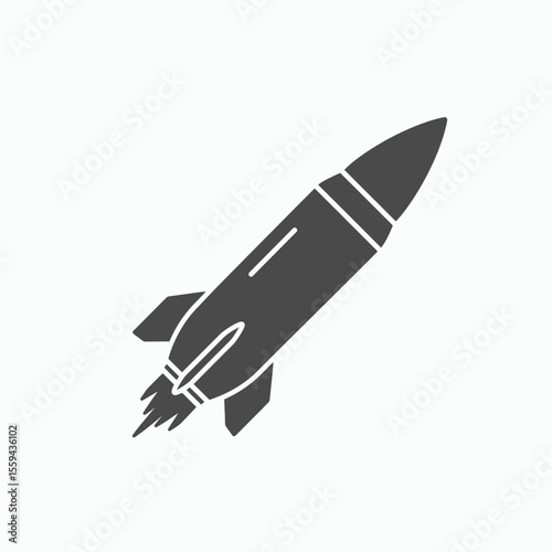 Grey silhouette of a launching rocket ship on a white background