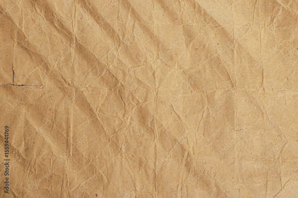 Fototapeta premium Crumpled Brown Kraft Paper Texture