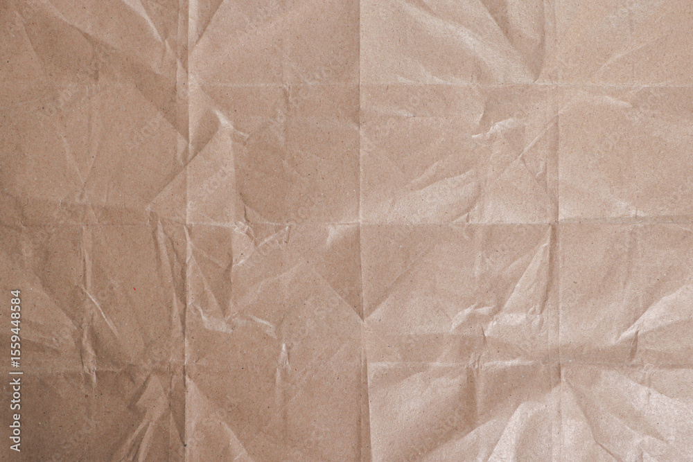 Obraz premium Crumpled Brown Kraft Paper Texture