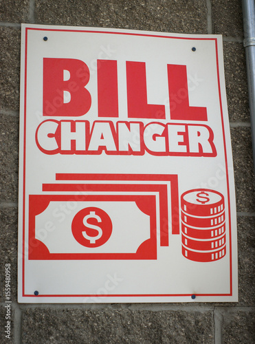 Bill changer sign on wall
