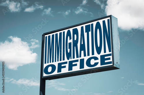 Immigration office sign with clouds
