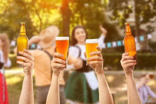 People with beer celebratin...