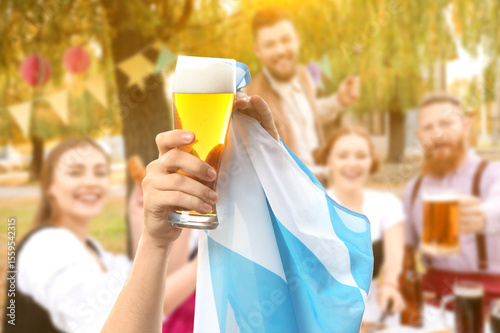Hands with flag of Bavaria ...