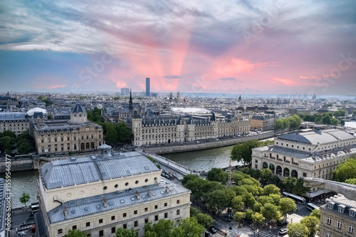 Fototapeta Naklejka Na Ścianę i Meble -  Paris, the city, with the Conciergerie on the Seine, the Montparnasse tower and the Eiffel Tower in background
