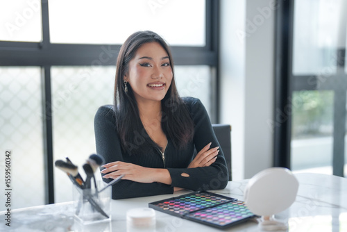 Asian girl makeup artist Professional Woman blogger vlogger is showing cosmetics products with recording video Beauty influencer asian girl video online marketing. Free Download Asian girl makeup artist Professional Woman blogger vlogger is showing cosmetics products with recording video Beauty influencer asian girl video online marketing. - GFXLoad